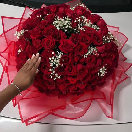 Bouquet of Fresh Roses and Gypsophila